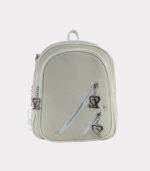 mochilas con cierres diagonales y dijes negocios